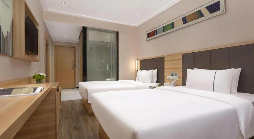 Bed in City Comfort Inn Changsha Window of the World Zhongmao City