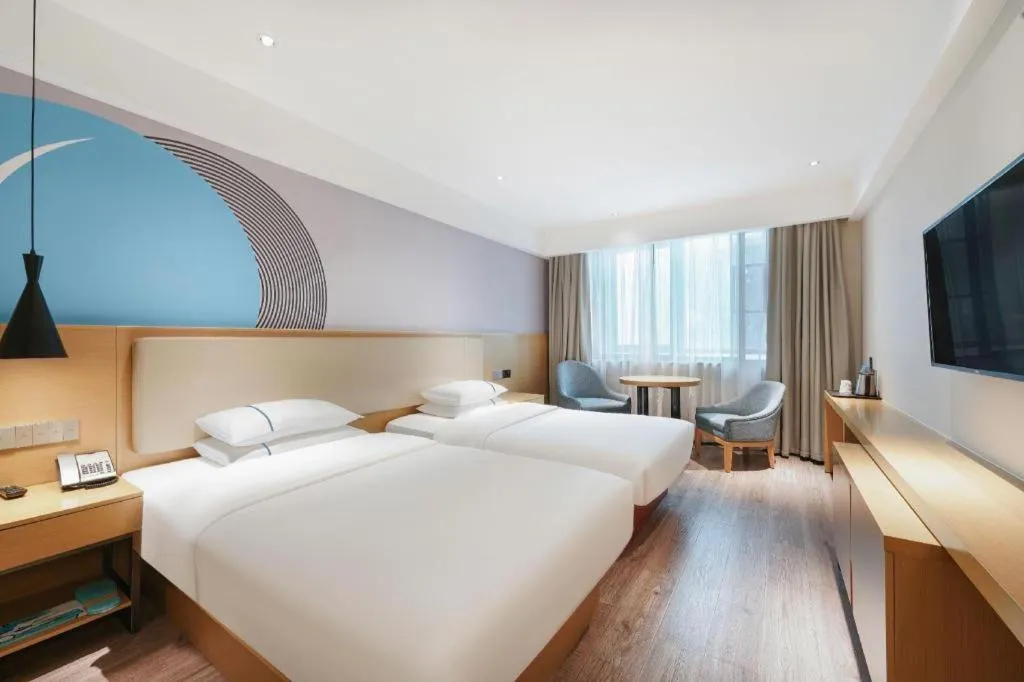 Bed in City Comfort Inn Guangzhou Shixi Metro Station Pazhou Exhibition