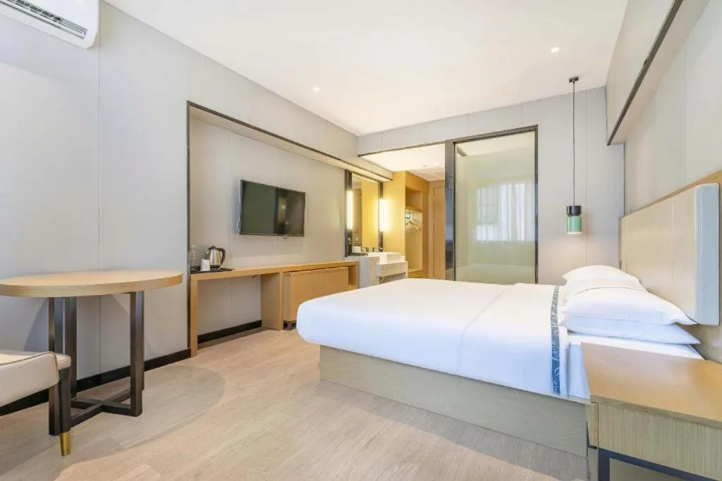 Bed in City Comfort Inn Guangzhou Shixi Metro Station Pazhou Exhibition