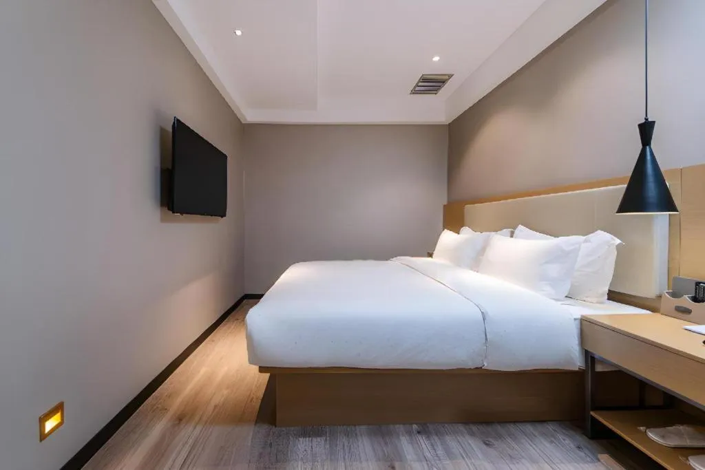 Bed in City Comfort Inn Guangzhou Shixi Metro Station Pazhou Exhibition