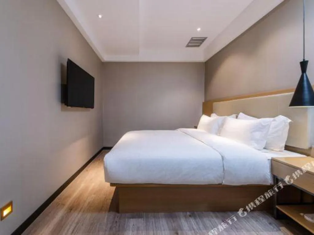 Bed in City Comfort Inn Guangzhou Shixi Metro Station Pazhou Exhibition