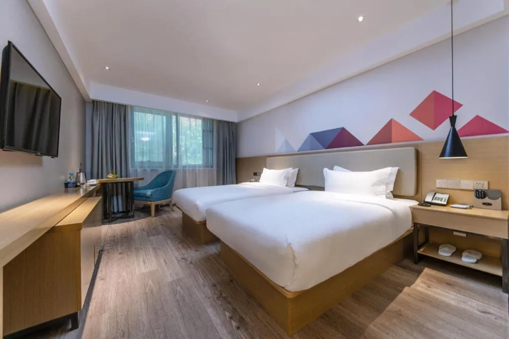 Bed in City Comfort Inn Guangzhou Shixi Metro Station Pazhou Exhibition