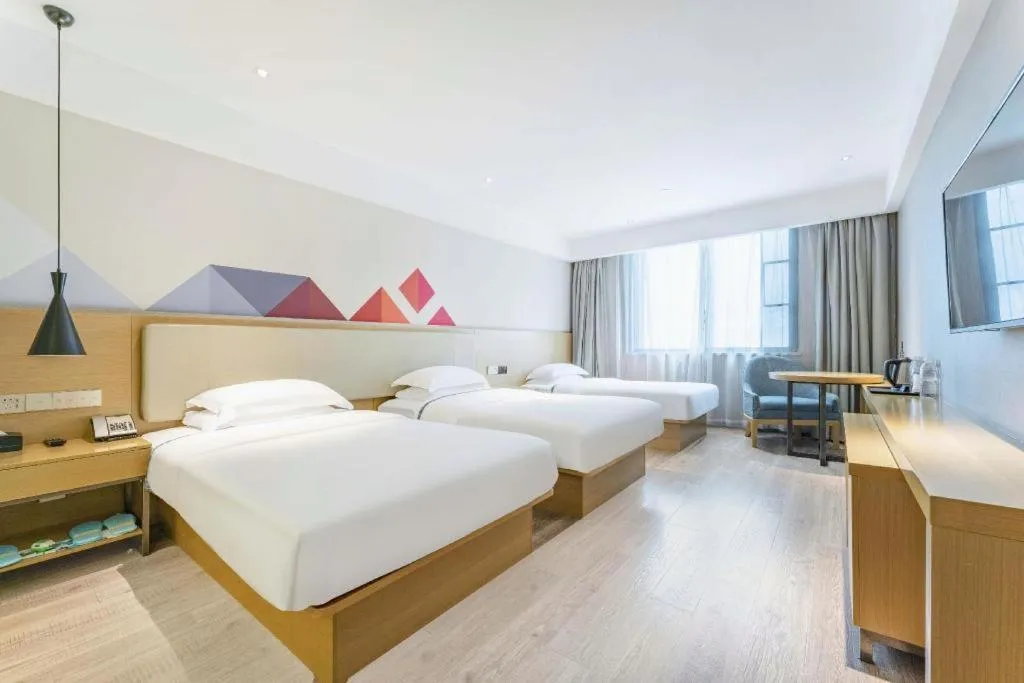 Bed in City Comfort Inn Guangzhou Shixi Metro Station Pazhou Exhibition