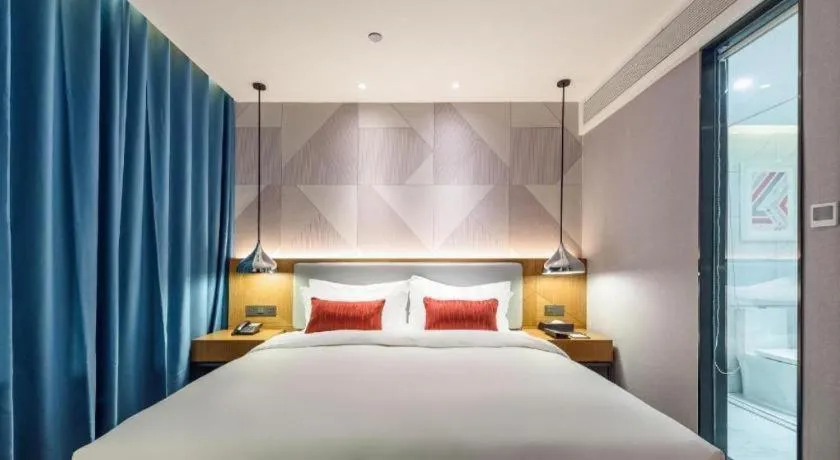 Bed in Borrman Hotel Guigang Pingnan Donghu