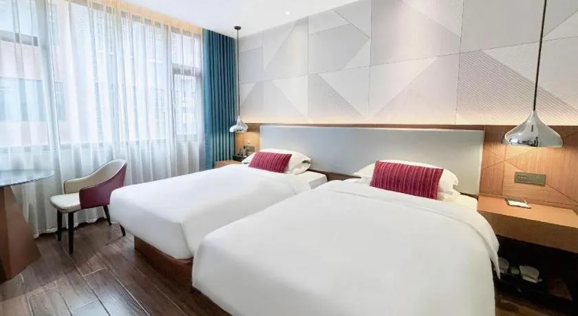 Bed in Borrman Hotel Guigang Pingnan Donghu