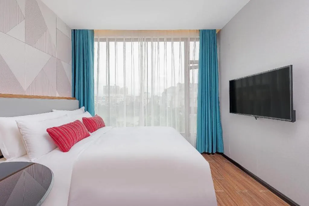 Bed in Borrman Hotel Guigang Pingnan Donghu