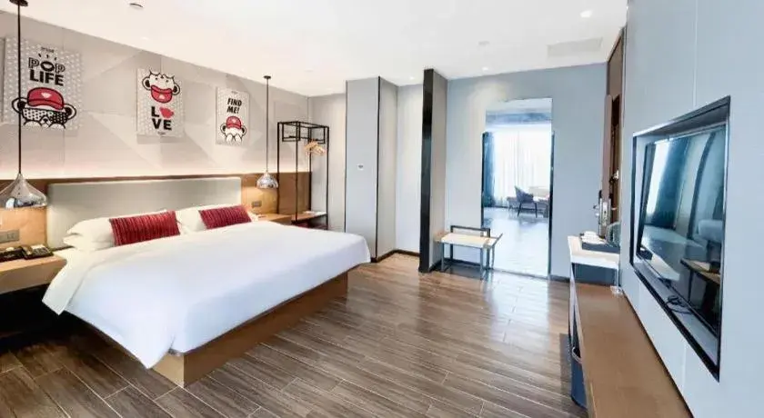 Bed in Borrman Hotel Guigang Pingnan Donghu Bed in Borrman Hotel Guigang Pingnan Donghu