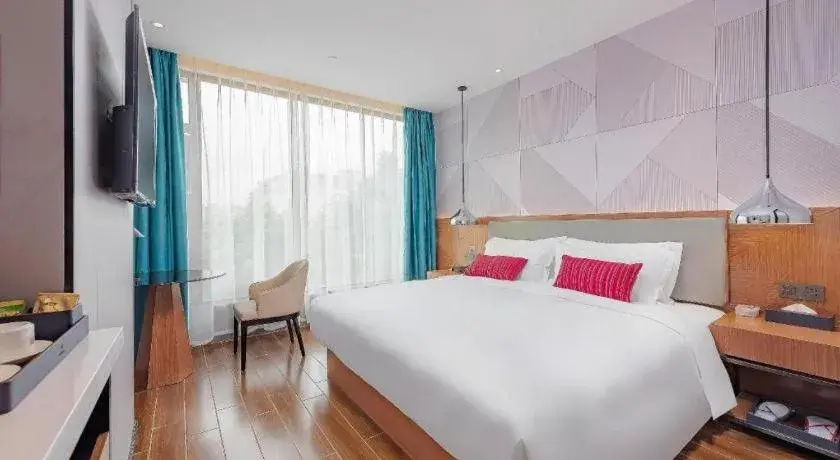 Bed in Borrman Hotel Guigang Pingnan Donghu Bed in Borrman Hotel Guigang Pingnan Donghu