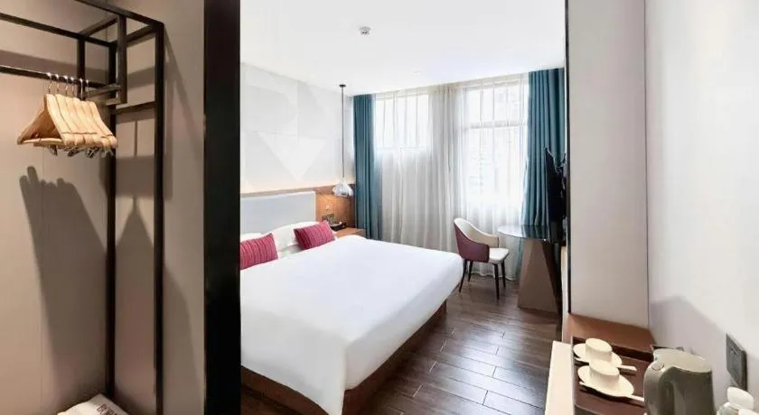 Bed in Borrman Hotel Guigang Pingnan Donghu