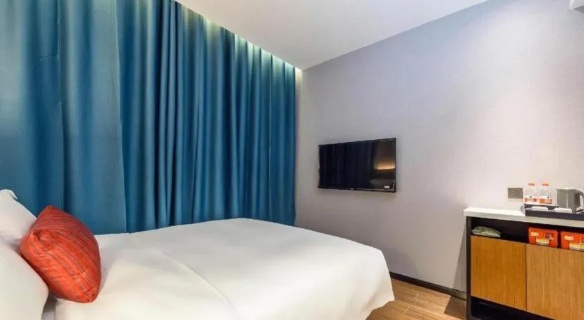 Bed in Borrman Hotel Guigang Pingnan Donghu