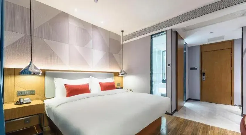 Bed in Borrman Hotel Guigang Pingnan Donghu Bed in Borrman Hotel Guigang Pingnan Donghu