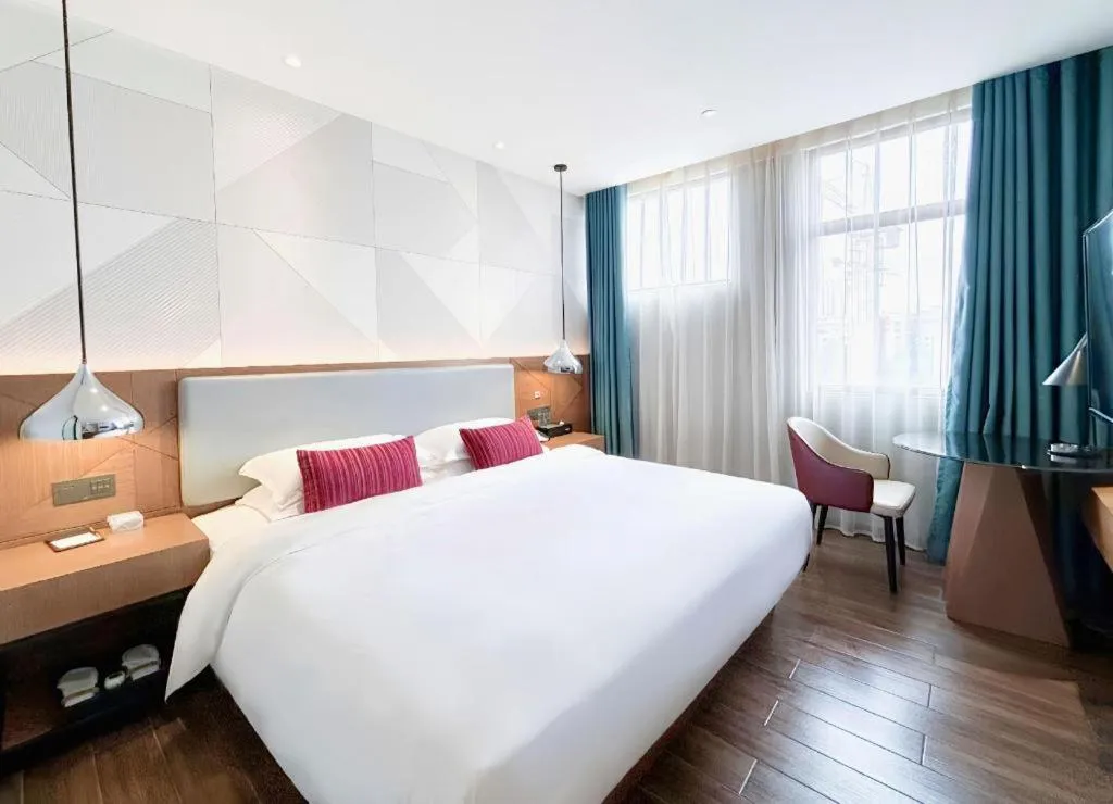 Bed in Borrman Hotel Guigang Pingnan Donghu