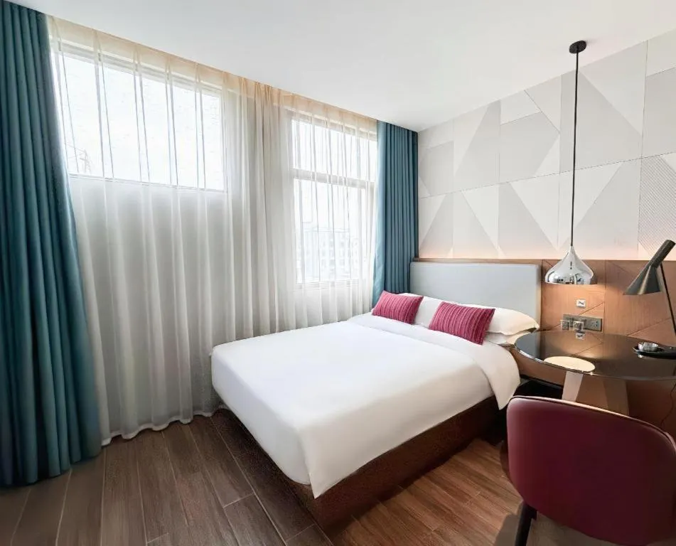 Bed in Borrman Hotel Guigang Pingnan Donghu