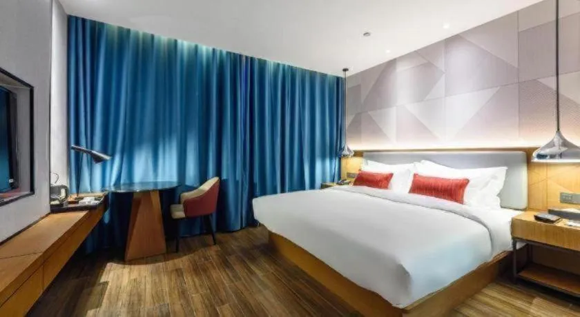 Bed in Borrman Hotel Guigang Pingnan Donghu