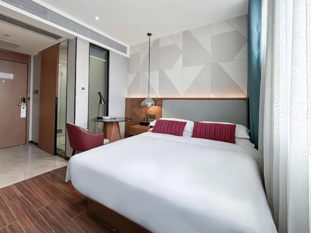 Bed in Borrman Hotel Guigang Pingnan Donghu