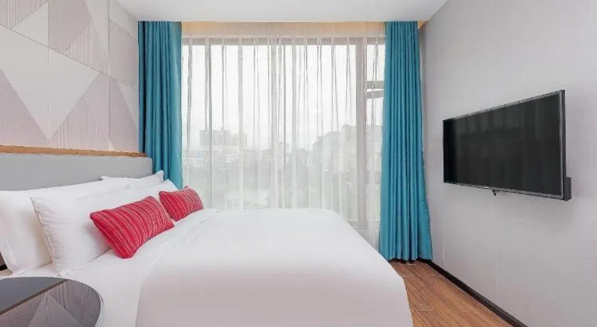 Bed in Borrman Hotel Guigang Pingnan Donghu