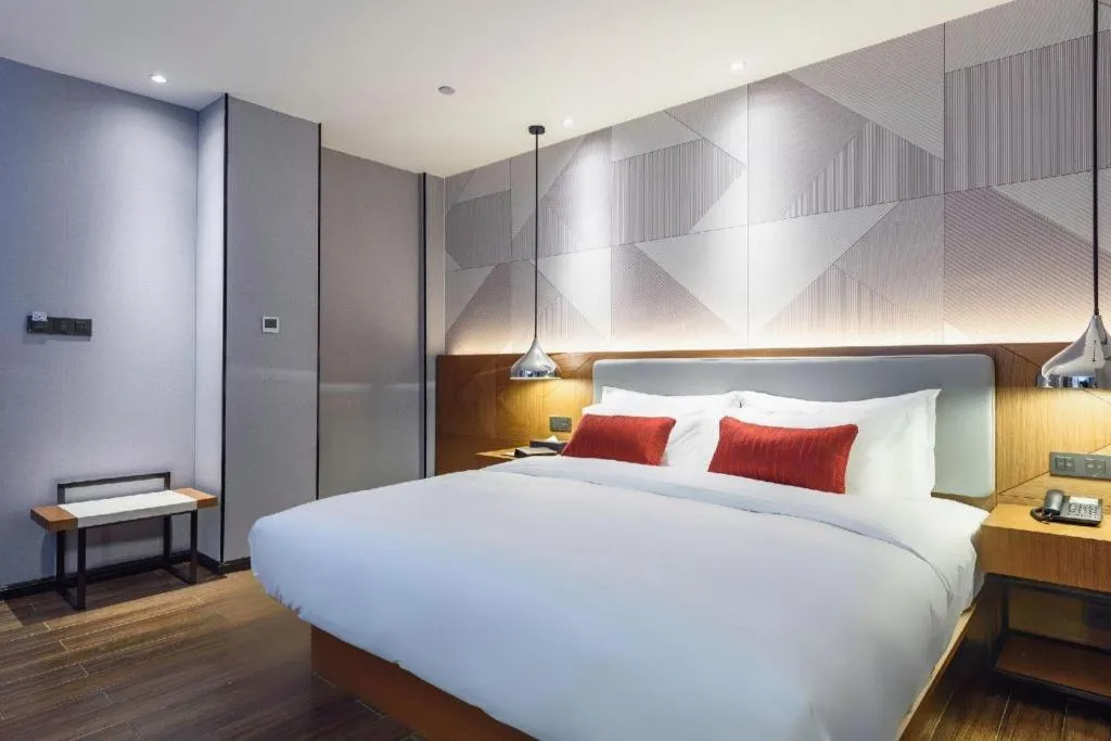 Bed in Borrman Hotel Guigang Pingnan Donghu