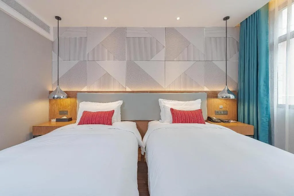 Bed in Borrman Hotel Guigang Pingnan Donghu