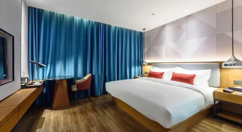 Bed in Borrman Hotel Guigang Pingnan Donghu Bed in Borrman Hotel Guigang Pingnan Donghu