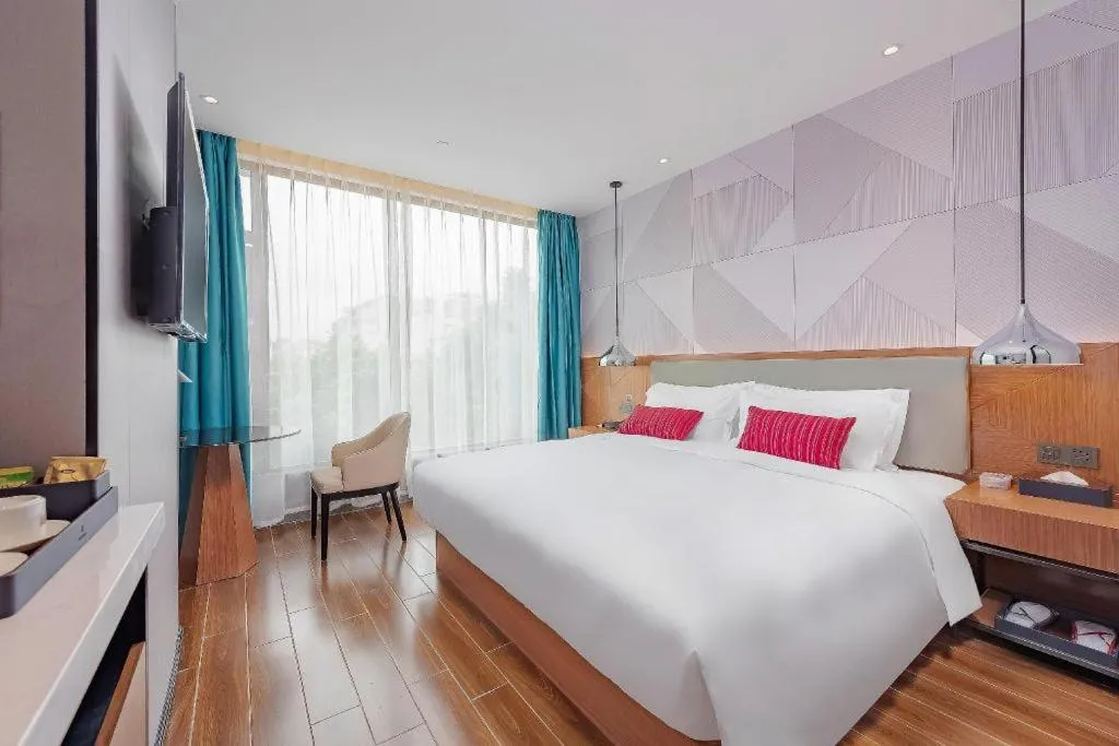 Bed in Borrman Hotel Guigang Pingnan Donghu