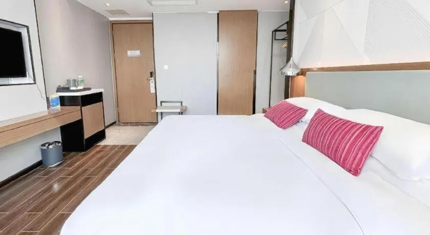 Bed in Borrman Hotel Guigang Pingnan Donghu