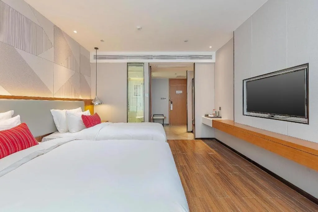 Bed in Borrman Hotel Guigang Pingnan Donghu