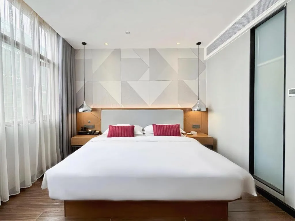 Bed in Borrman Hotel Guigang Pingnan Donghu