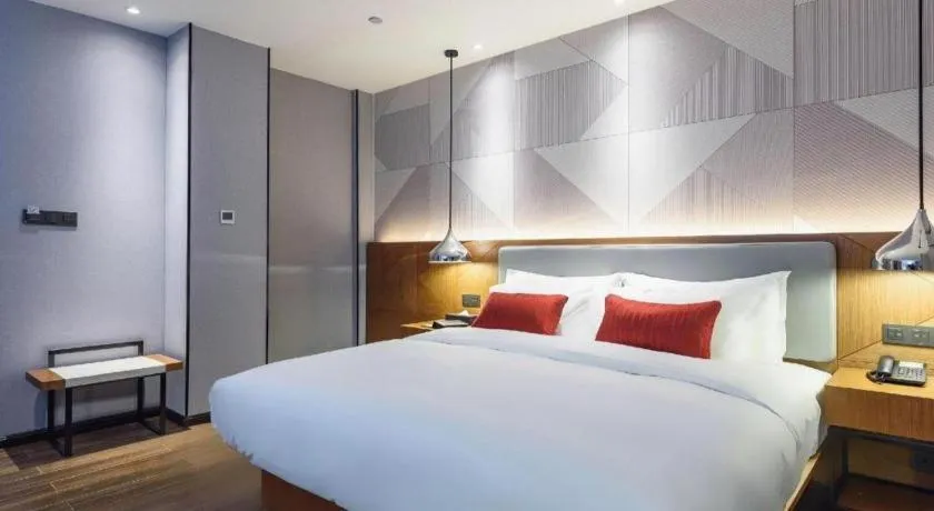 Bed in Borrman Hotel Guigang Pingnan Donghu