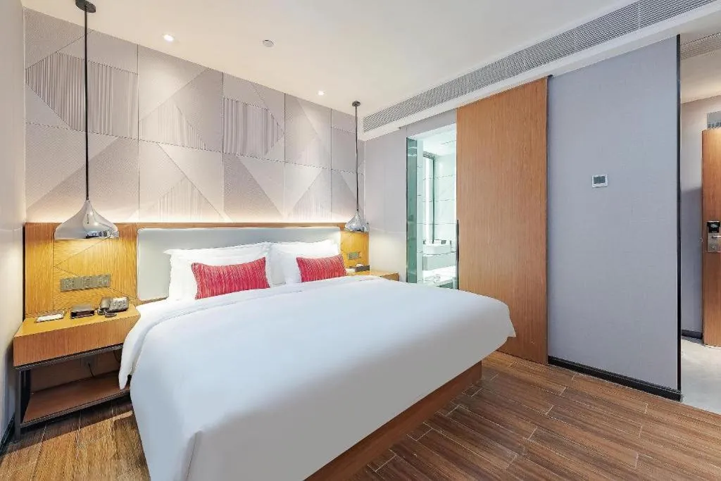 Bed in Borrman Hotel Guigang Pingnan Donghu