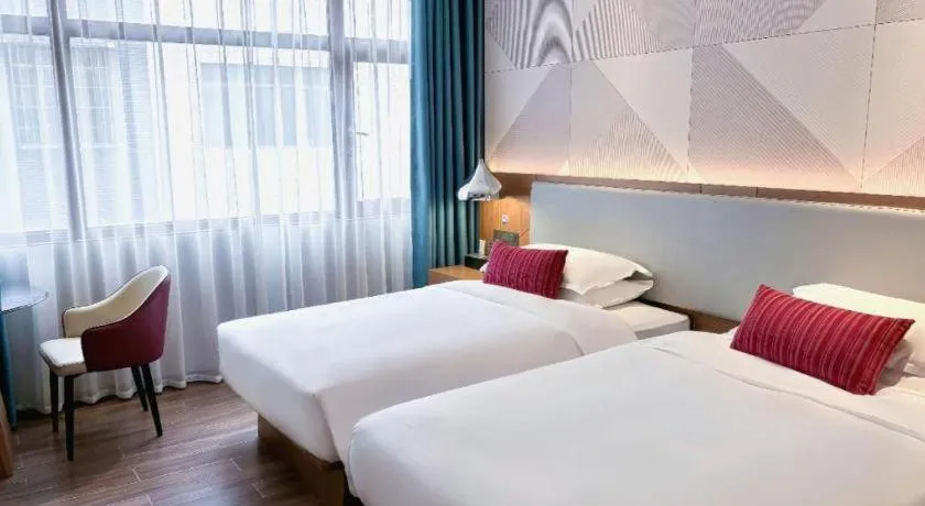 Bed in Borrman Hotel Guigang Pingnan Donghu