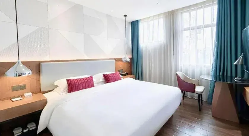 Bed in Borrman Hotel Guigang Pingnan Donghu Bed in Borrman Hotel Guigang Pingnan Donghu