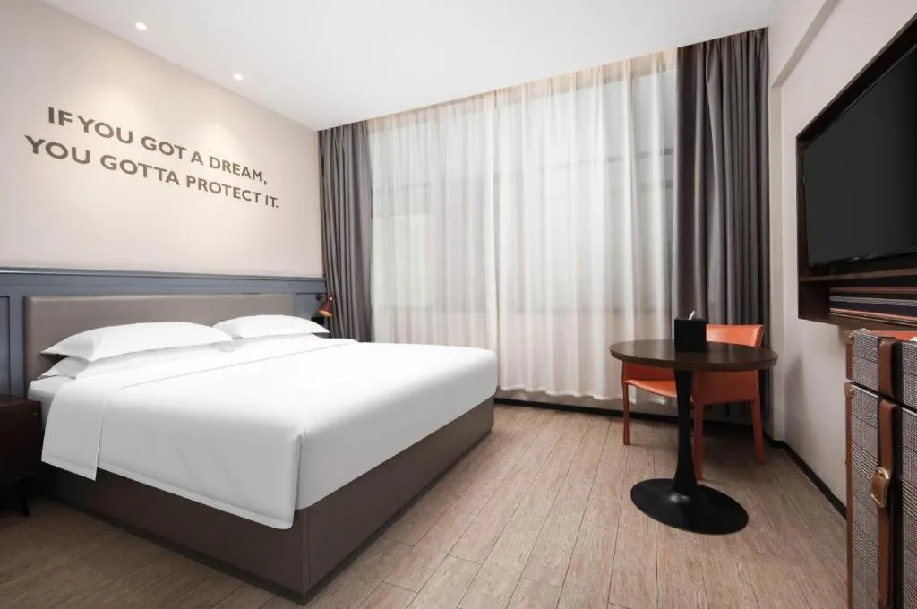 Bed in City Comfort Premier Hotel Wuhan Wangjiawan Hanyang Bus Station Metro Station