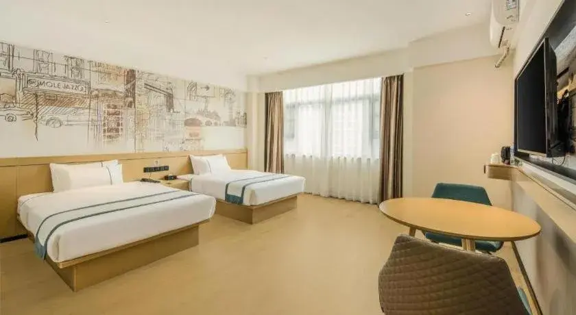 Bed in City Comfort Inn Dandong Railway Station Yalu River Scenic Area Bed in City Comfort Inn Dandong Railway Station Yalu River Scenic Area