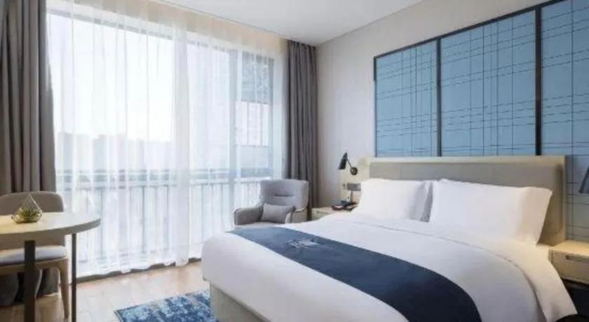 Bed in Echarm Hotel Changsha Yuelu Mountain West Bus Station Metro Station