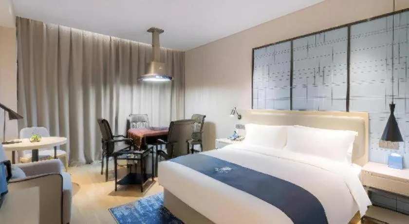 Bed in Echarm Hotel Changsha Yuelu Mountain West Bus Station Metro Station