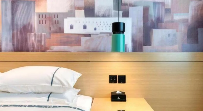 Bed in City Comfort Inn Nanchang Zhangshulin Shashagou Metro Station