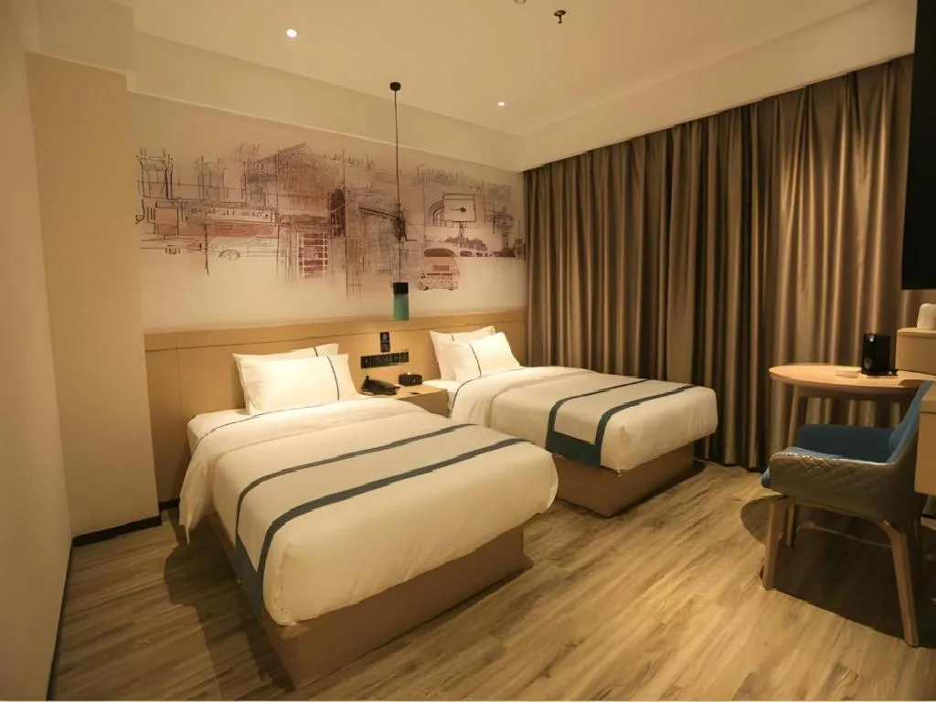 Bed in City Comfort Inn Nanchang Zhangshulin Shashagou Metro Station