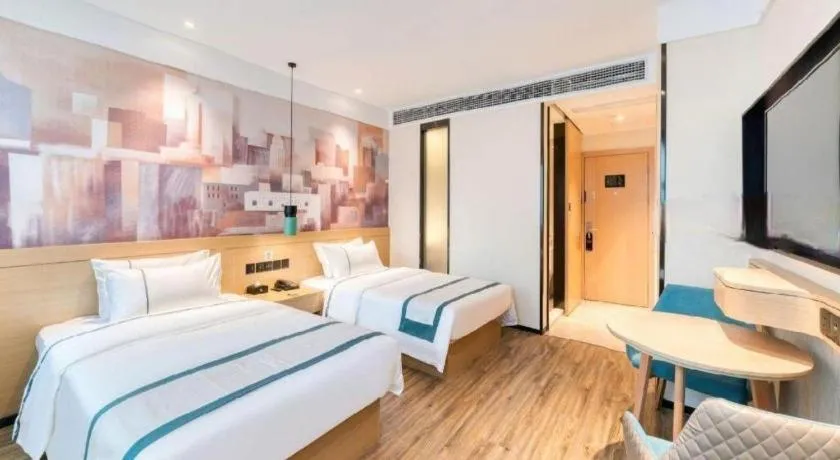 Bed in City Comfort Inn Nanchang Zhangshulin Shashagou Metro Station