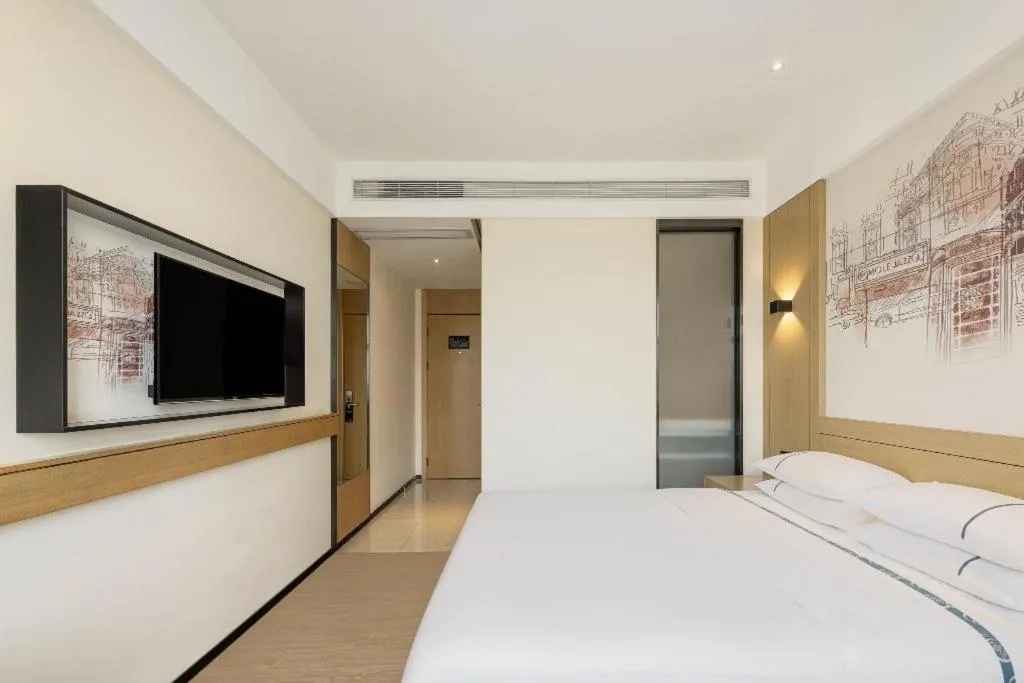 Bed in City Comfort Inn Nanchang Zhangshulin Shashagou Metro Station