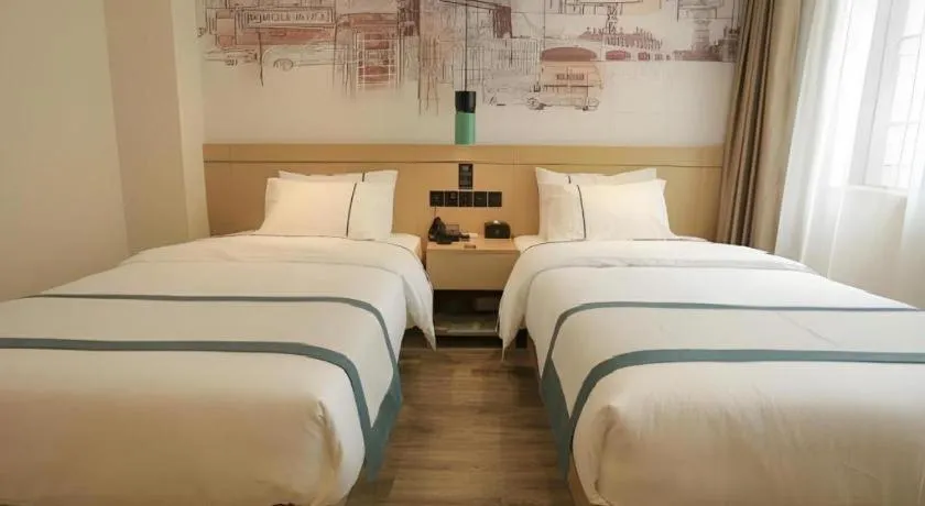 Bed in City Comfort Inn Nanchang Zhangshulin Shashagou Metro Station