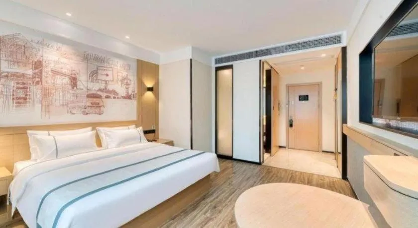 Bed in City Comfort Inn Nanchang Zhangshulin Shashagou Metro Station