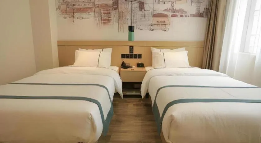 Bed in City Comfort Inn Nanchang Zhangshulin Shashagou Metro Station