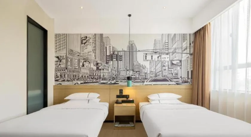 Bed in City Comfort Inn Nanchang Zhangshulin Shashagou Metro Station