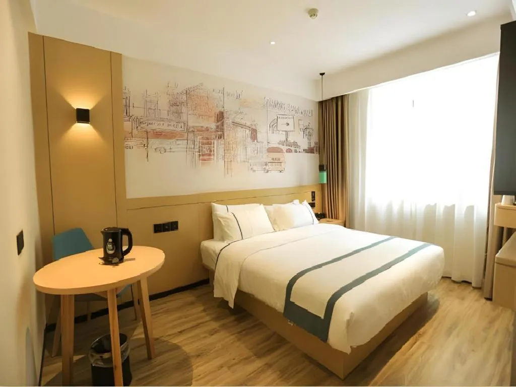 Bed in City Comfort Inn Nanchang Zhangshulin Shashagou Metro Station