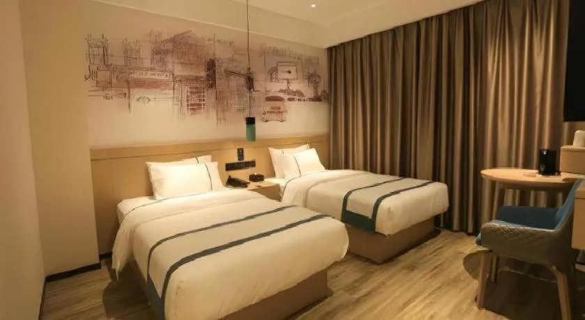 Bed in City Comfort Inn Nanchang Zhangshulin Shashagou Metro Station