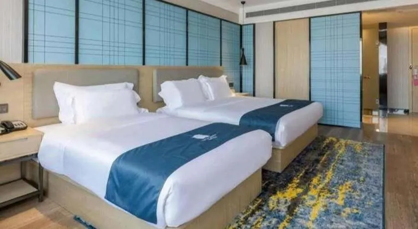 Bed in Echarm Hotel Changsha Wuyi Square Railway Metro Station