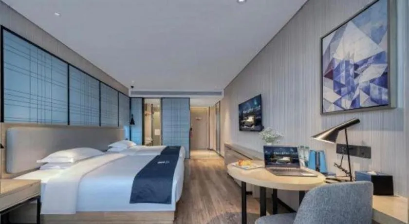 Bed in Echarm Hotel Changsha Wuyi Square Railway Metro Station