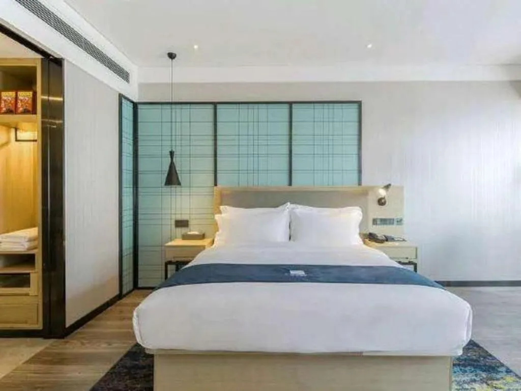 Bed in Echarm Hotel Changsha Wuyi Square Railway Metro Station