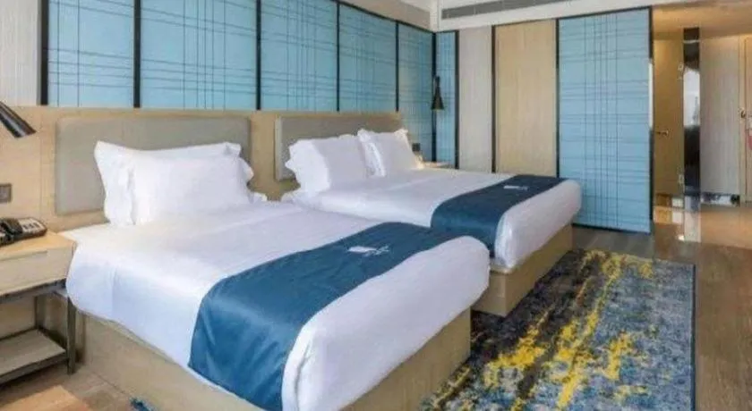 Bed in Echarm Hotel Changsha Wuyi Square Railway Metro Station