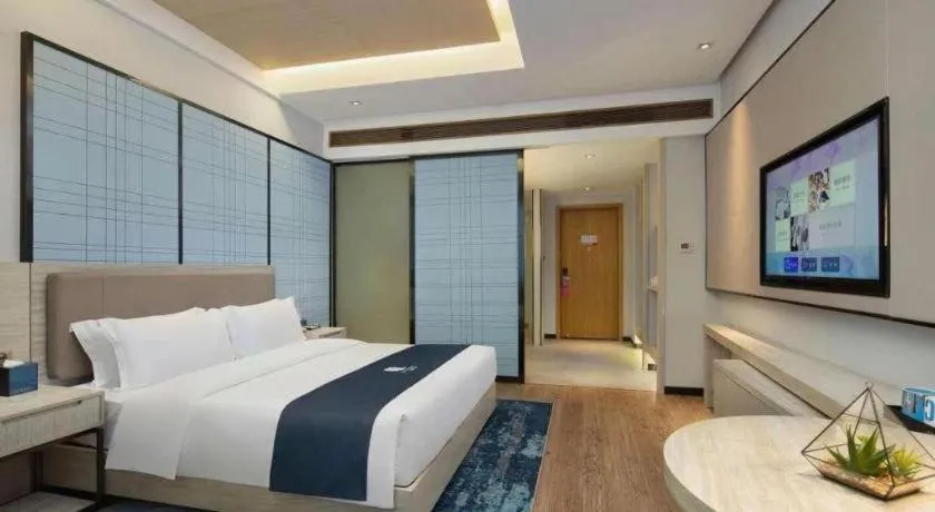 Bed in Echarm Hotel Changsha Wuyi Square Railway Metro Station